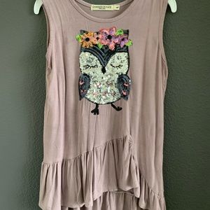 Tank top with a cute skirt on the bottom making for a beautiful dress top